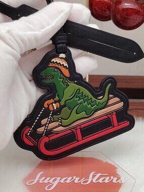 COACH REXY ON SNOW SLED BAG CHARM CF090
